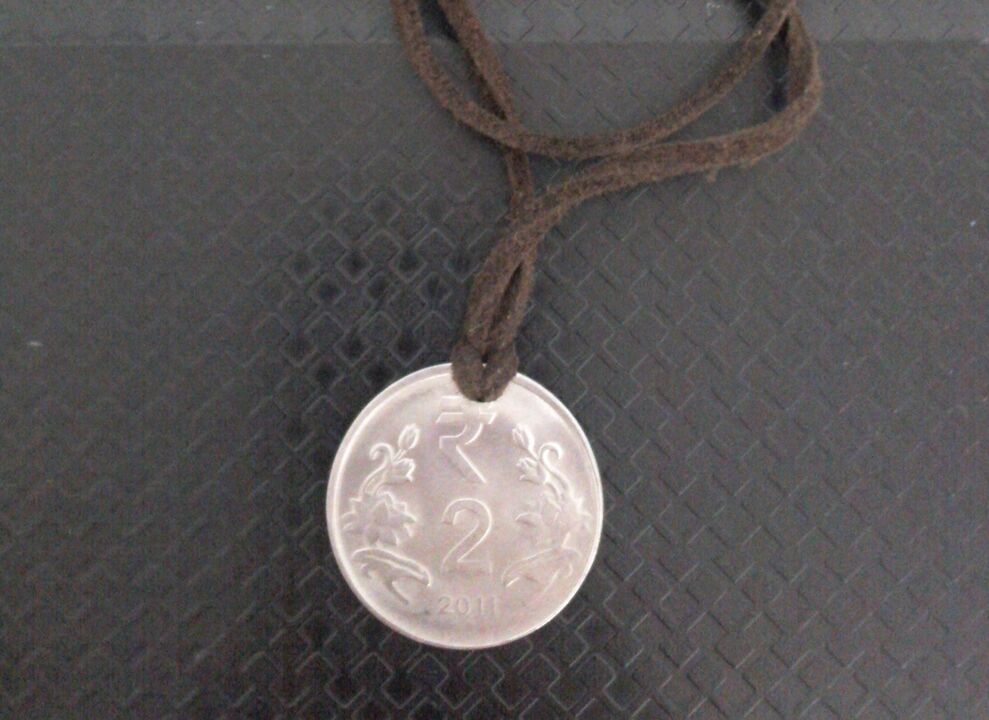 Amulet coin that attracts wealth