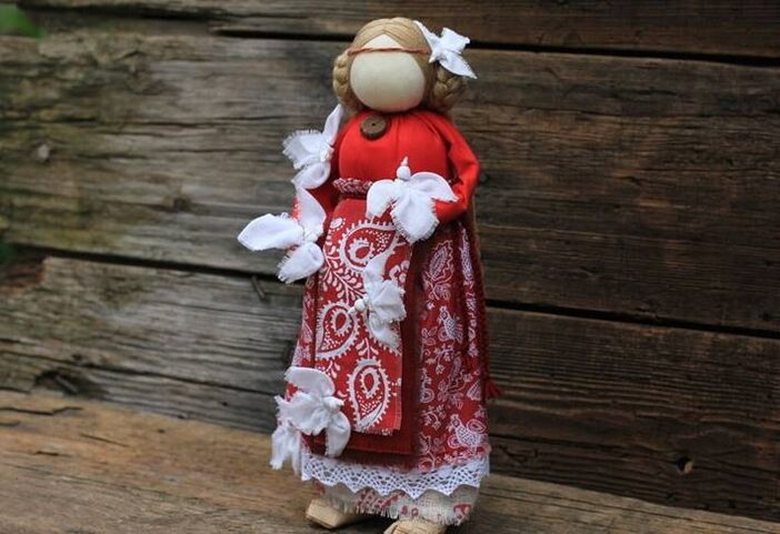 Bird-joy, a Slavic doll, brings happiness into the house